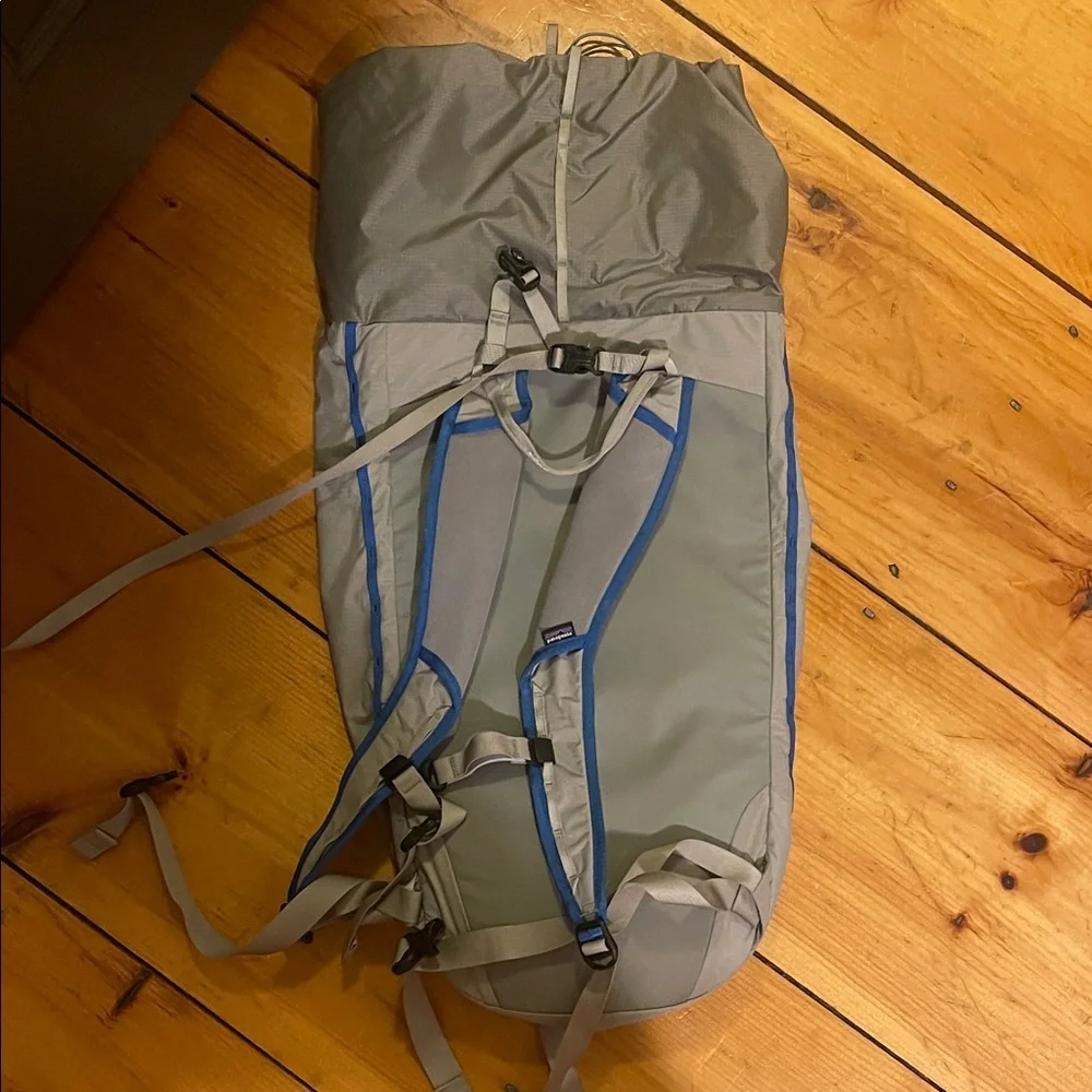 Patagonia Light Gray Backpack with Blue Accents